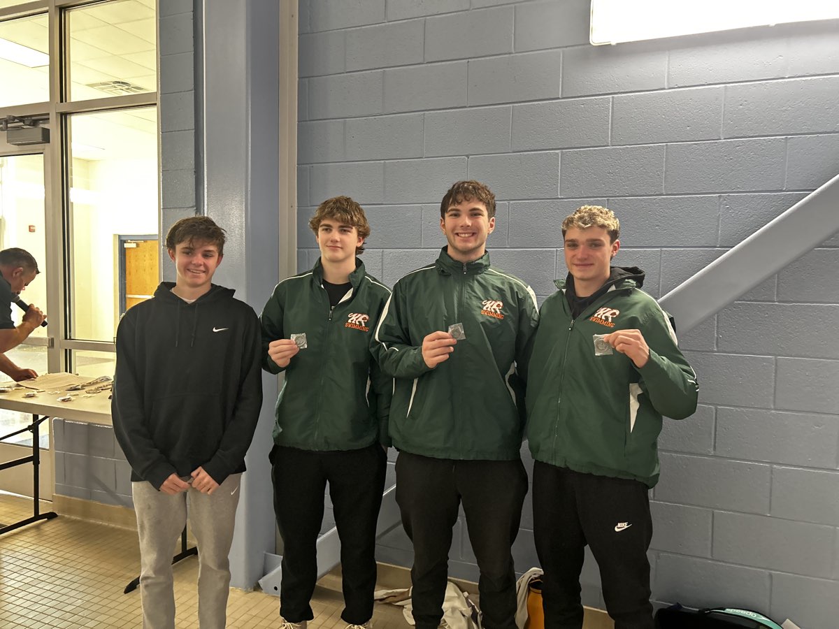 Four Kettle Run boys holding up their medals