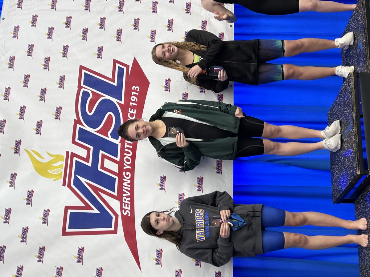 A Kettle Run swimmer on the podium at the VHSL state championship