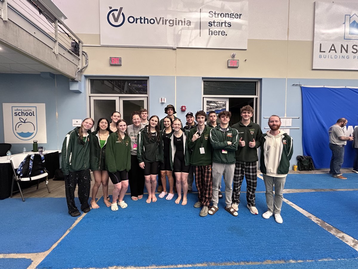 The Kettle Run boys and girls teams together on the pool deck at a championship meet